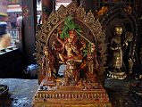 Kathmandu Patan Golden Temple 31 Statue Of Figure With Four Arms Riding On A Snow Lion Outside Entrance Door To The Swayambhu Chaitya 